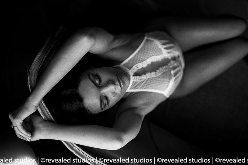 Chicago boudoir photos of real client posing on couch