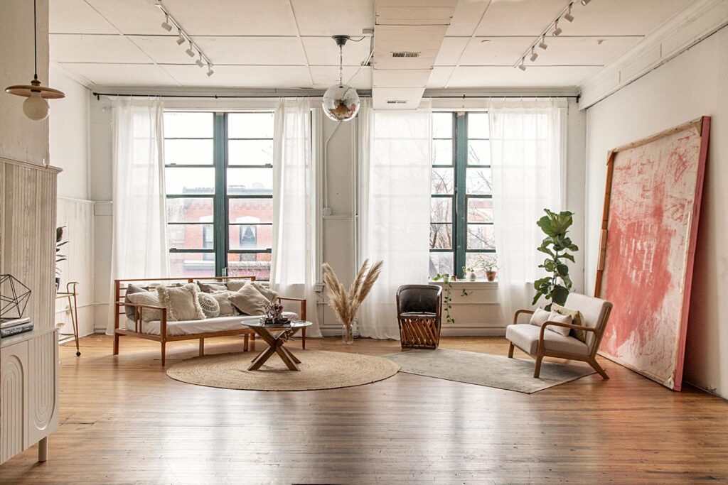 a photo showing a living room set at revealed studios a chicago boudoir studio in wicker park