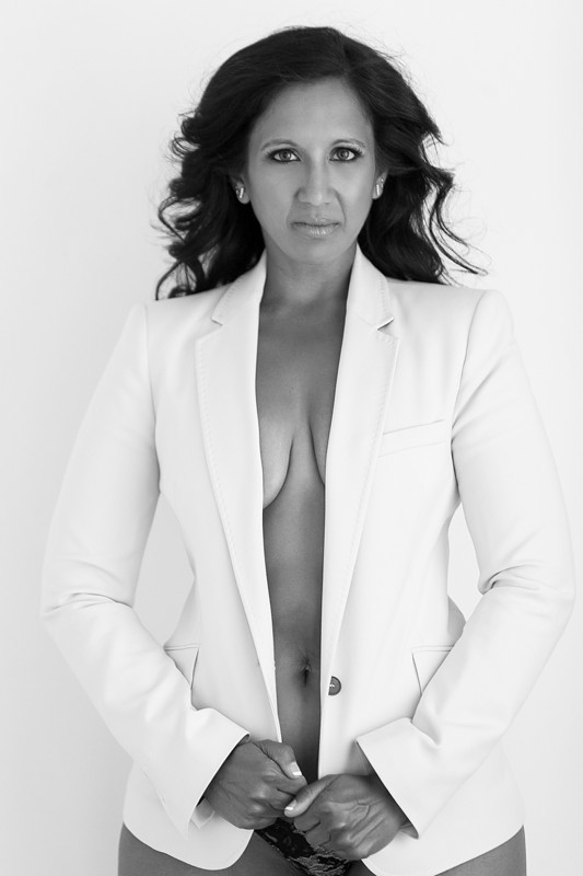 woman wearing a blazer for a boudoir photoshoot